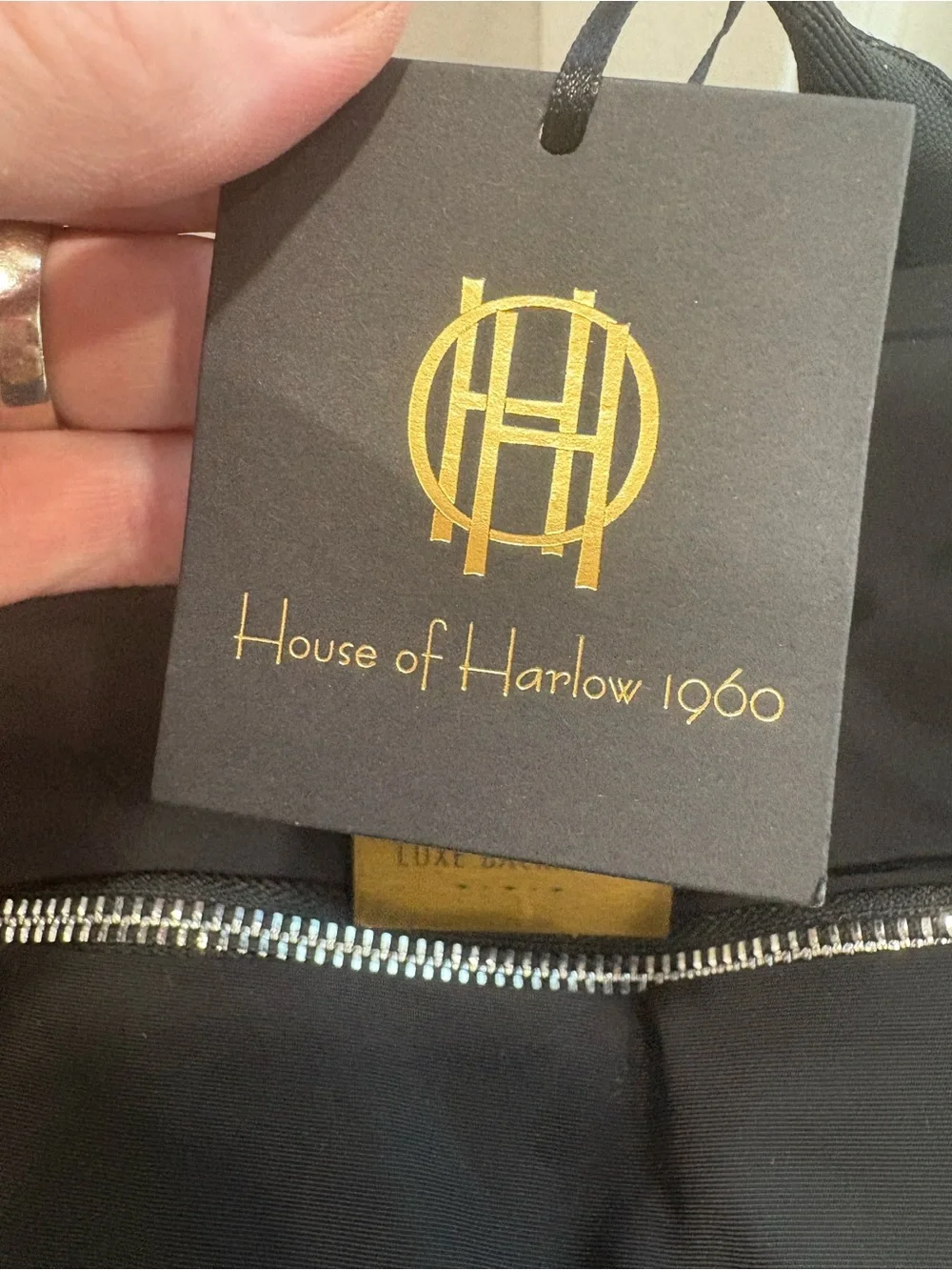 NWT House of Harlow 1960 backpack in a classic black w/ silver-tone hardware